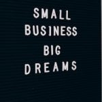 Close-up of a motivational quote about small business dreams on a letter board.